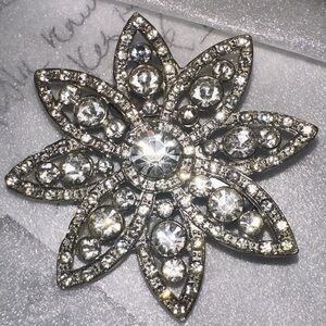 Elegant Silver Floral Brooch